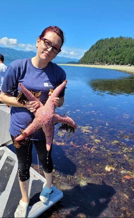 VIU student holding a pink starfish