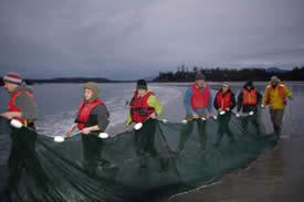 RMOT students holding a fish net